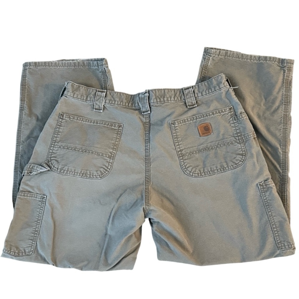 Carhartt‎ 38x30 distressed tan pants, has wear but sturdy pants